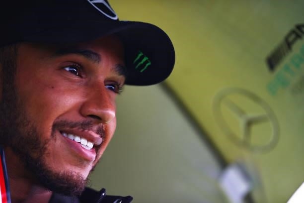 Third place qualifier Lewis Hamilton of Great Britain and Mercedes GP looks on in parc ferme during qualifying ahead of the F1 Grand Prix of Belgium...
