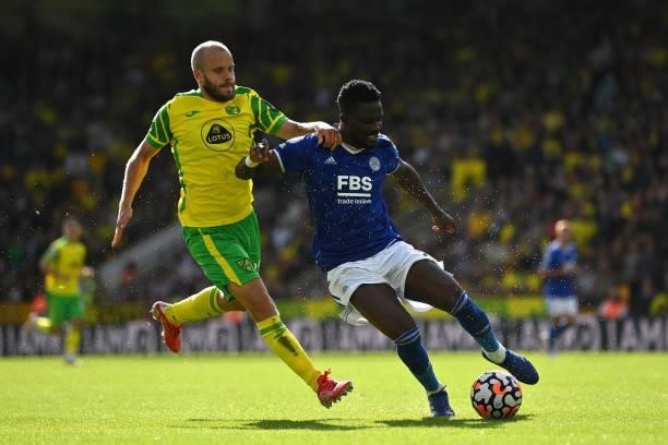 Teemu Pukki of Norwich City challenges Daniel Amartey of Leicester City during the Premier League match between Norwich City and Leicester City at...