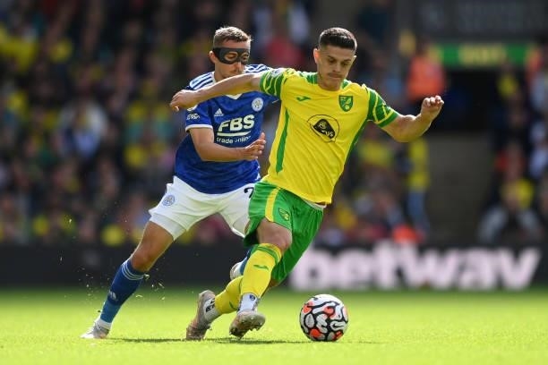 Milot Rashica of Norwich City takes on Timoty Castagne of Leicester City during the Premier League match between Norwich City and Leicester City at...