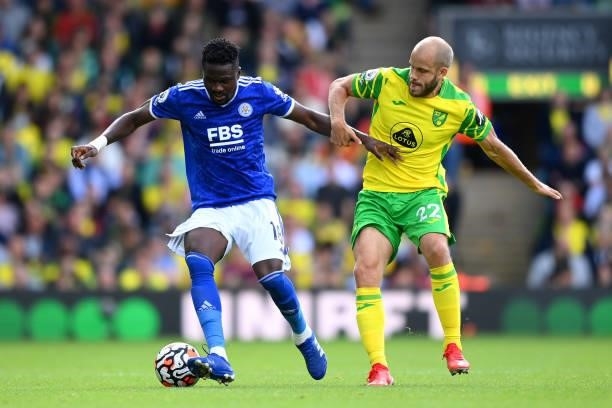 Teemu Pukki of Norwich City challenges Daniel Amartey of Leicester City during the Premier League match between Norwich City and Leicester City at...