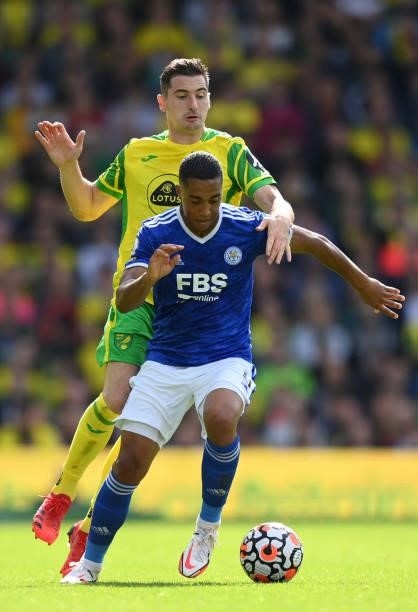 Youri Tielemans of Leicester City holds off Kenny McLean of Norwich City during the Premier League match between Norwich City and Leicester City at...