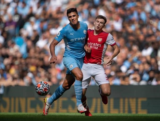 Kieran Tierney of Arsenal and Rodri of Manchester City in action during the Premier League match between Manchester City and Arsenal at Etihad...