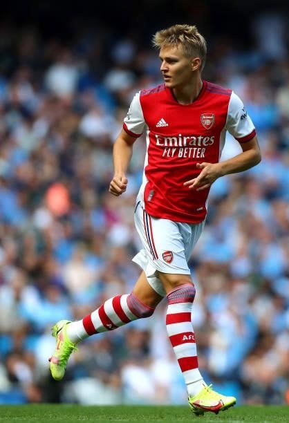 Martin Odegaard of Arsenal in action during the Premier League match between Manchester City and Arsenal at Etihad Stadium on August 28, 2021 in...