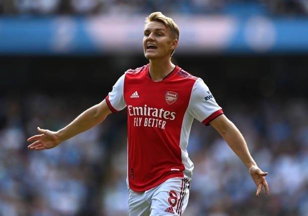Martin Odegaard of Arsenal reacts during the Premier League match between Manchester City and Arsenal at Etihad Stadium on August 28, 2021 in...