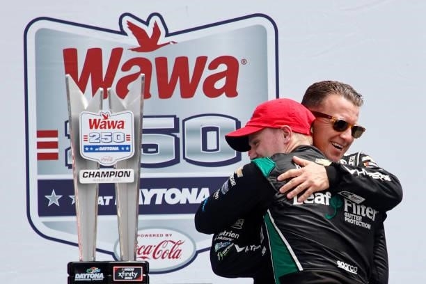 Allmendinger, driver of the Hyperice Chevrolet, congratulates Justin Haley, driver of the LeafFilter Gutter Protection Chevrolet, in the Ruoff...