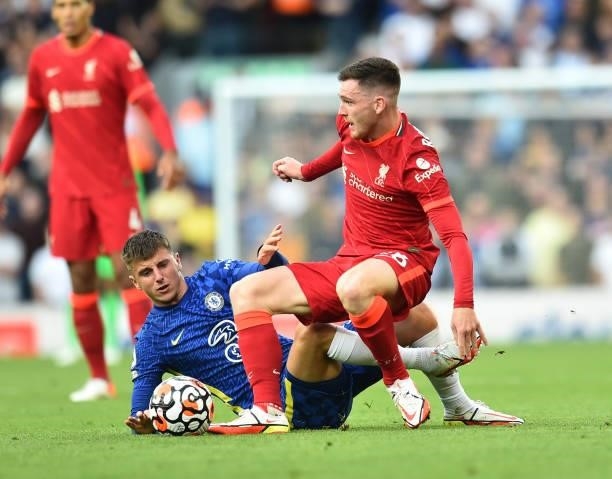 Andy Robertson of Liverpool with Chelsea's Mason Mount during the Premier League match between Liverpool and Chelsea at Anfield on August 28, 2021 in...