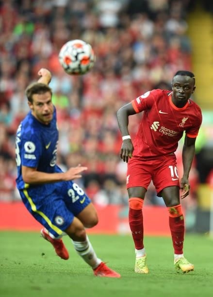 Sadio Mane of Liverpool with Chelsea's Cesar Azpilicueta during the Premier League match between Liverpool and Chelsea at Anfield on August 28, 2021...