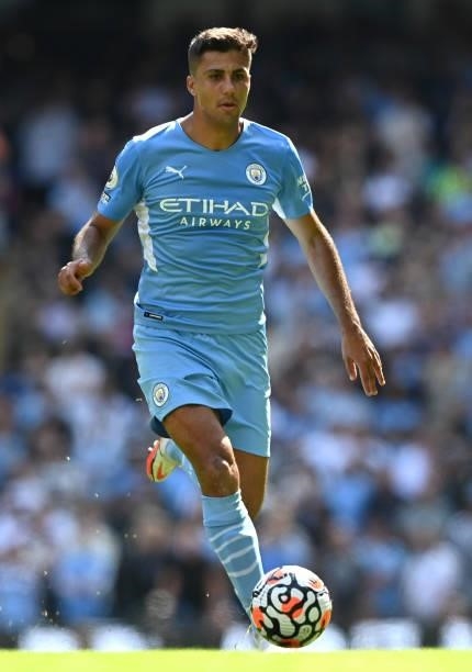Rodri of Manchester City runs with the ball during the Premier League match between Manchester City and Arsenal at Etihad Stadium on August 28, 2021...