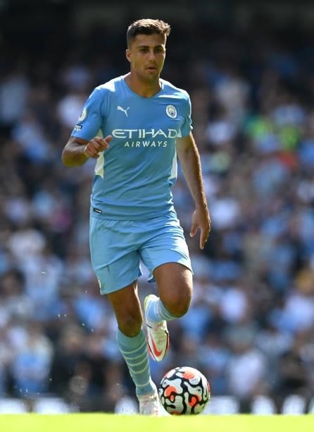 Rodri of Manchester City runs with the ball during the Premier League match between Manchester City and Arsenal at Etihad Stadium on August 28, 2021...