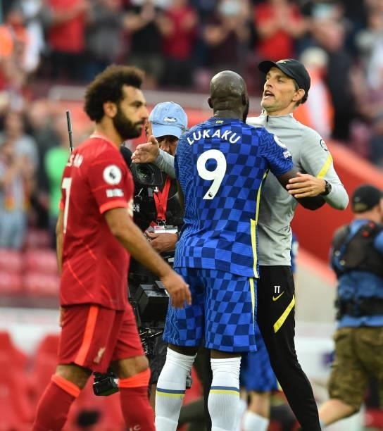 Chelsea manager Thomas Tuchel with Chelsea's Romelu Lukaku at the end of the Premier League match between Liverpool and Chelsea at Anfield on August...