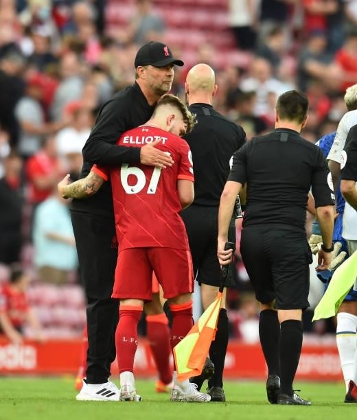 Harvey Elliott of Liverpool with Jurgen Klopp manager of Liverpool at the end of the Premier League match between Liverpool and Chelsea at Anfield on...