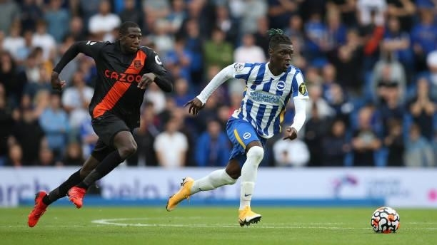 Yves Bissouma of Brighton & Hove Albion breaks away from Abdoulaye Doucoure of Everton during the Premier League match between Brighton & Hove Albion...