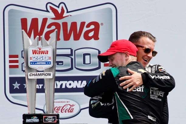 Allmendinger, driver of the Hyperice Chevrolet, congratulates Justin Haley, driver of the LeafFilter Gutter Protection Chevrolet, in the Ruoff...