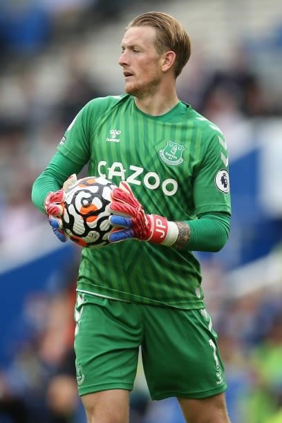 Jordan Pickford of Everton looks to throw the ball out during the Premier League match between Brighton & Hove Albion and Everton at American Express...