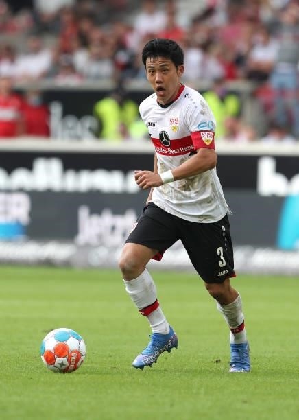 Wataru Endo of VfB Stuttgart controls the ball during the Bundesliga match between VfB Stuttgart and Sport-Club Freiburg at Mercedes-Benz Arena on...