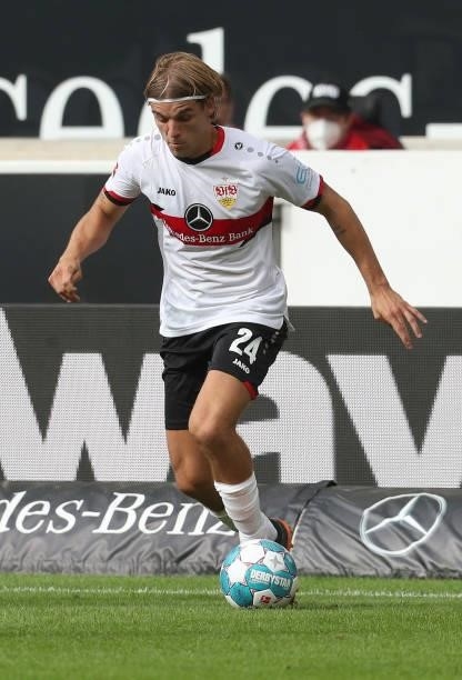 Borna Sosa of VfB Stuttgart controls the ball during the Bundesliga match between VfB Stuttgart and Sport-Club Freiburg at Mercedes-Benz Arena on...