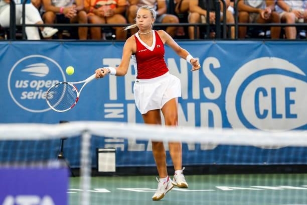 Anett Kontaveit of Estonia returns a serve during the first set of her finals match against Irina-Camelia Begu of Romania on day 7 of the Cleveland...