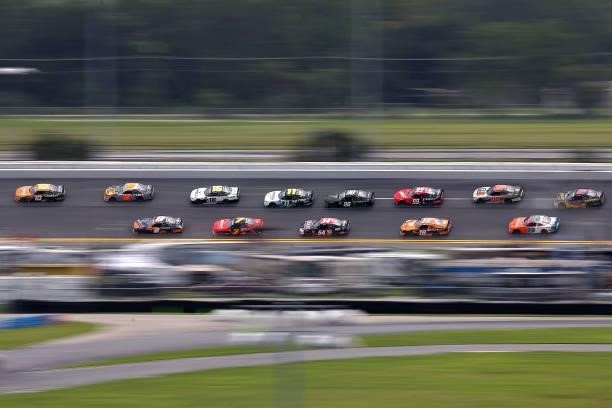 Jeb Burton, driver of the Cheddar's Scratch Kitchen Chevrolet, leads the field during the NASCAR Xfinity Series Wawa 250 at Daytona International...