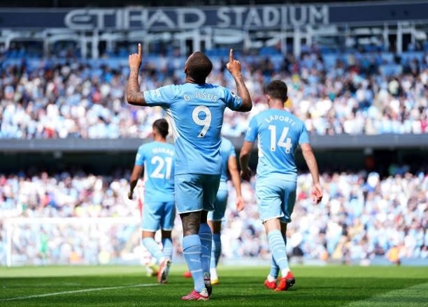 Gabriel Jesus of Manchester City celebrates after scoring his teams third goal during the Premier League match between Manchester City and Arsenal at...