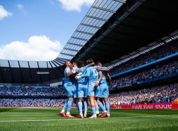 Manchester City players celebrate after the second goal during the Premier League match between Manchester City and Arsenal at Etihad Stadium on...