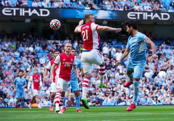Ilkay Gundogan of Manchester City scores his teams first goal during the Premier League match between Manchester City and Arsenal at Etihad Stadium...