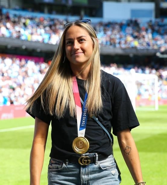 Janine Beckie of Manchester City wears her Olympic Gold Medal at half time during the Premier League match between Manchester City and Arsenal at...