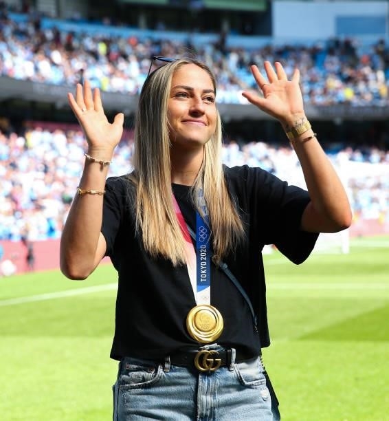 Janine Beckie of Manchester City wears her Olympic Gold Medal at half time during the Premier League match between Manchester City and Arsenal at...