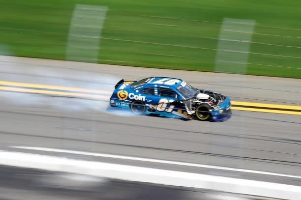 Joe Graf Jr., driver of the G Coin Chevrolet, drives a damaged car after an on-track incident during the NASCAR Xfinity Series Wawa 250 at Daytona...