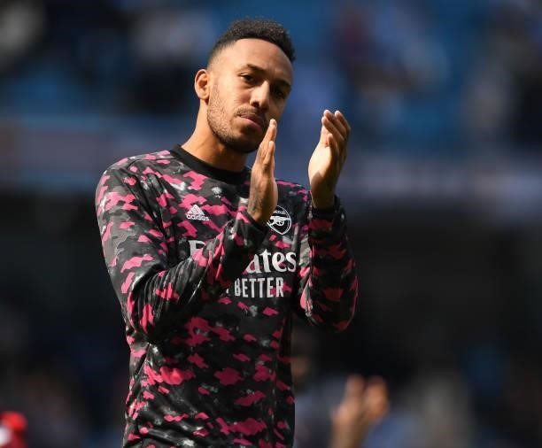 Pierre-Emerick Aubameyang applauds the Arsenal fans after the Premier League match between Manchester City and Arsenal at Etihad Stadium on August...
