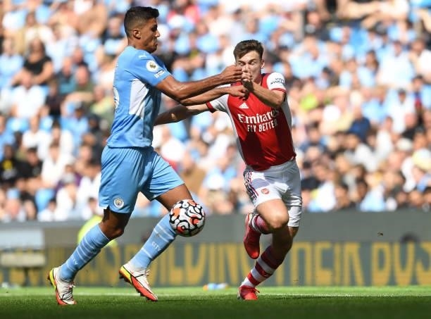 Kieran Tierney of Arsenal fouled by Rodri of Man City during the Premier League match between Manchester City and Arsenal at Etihad Stadium on August...