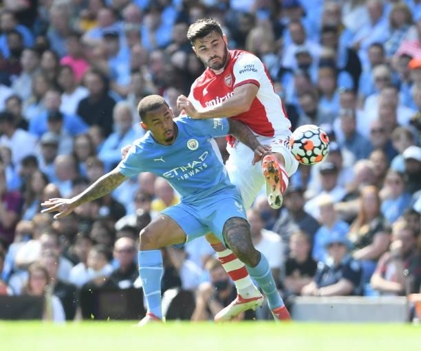 Sead Kolasinac of Arsenal challenges Gabriel Jesus of Man City bduring the Premier League match between Manchester City and Arsenal at Etihad Stadium...