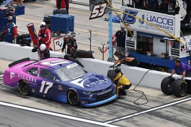 Yeley, driver of the Figgers Wireless Chevrolet, pits during the NASCAR Xfinity Series Wawa 250 at Daytona International Speedway on August 28, 2021...