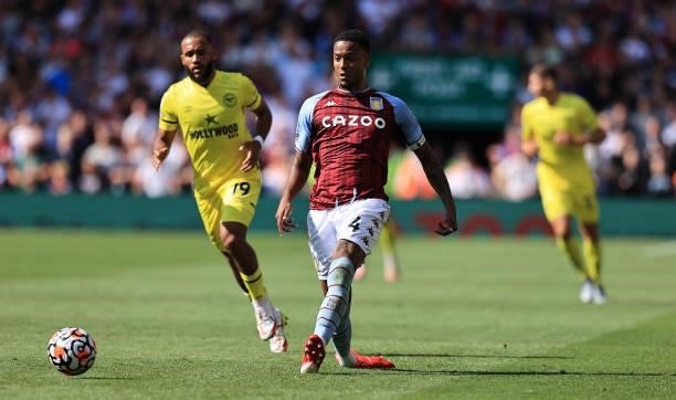 Ezri Konsa of Aston Villa passes the ball during the Premier League match between Aston Villa and Brentford at Villa Park on August 28, 2021 in...