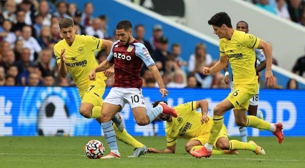 Emiliano Buendia of Aston Villa breaks with the ball during the Premier League match between Aston Villa and Brentford at Villa Park on August 28,...
