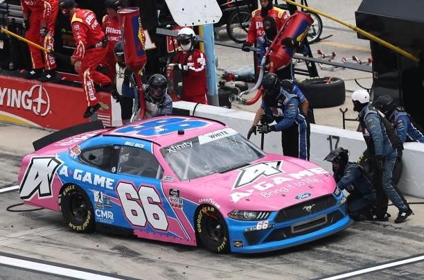 Jason White, driver of the A-Game/CMR Construction Ford, pits during the NASCAR Xfinity Series Wawa 250 at Daytona International Speedway on August...
