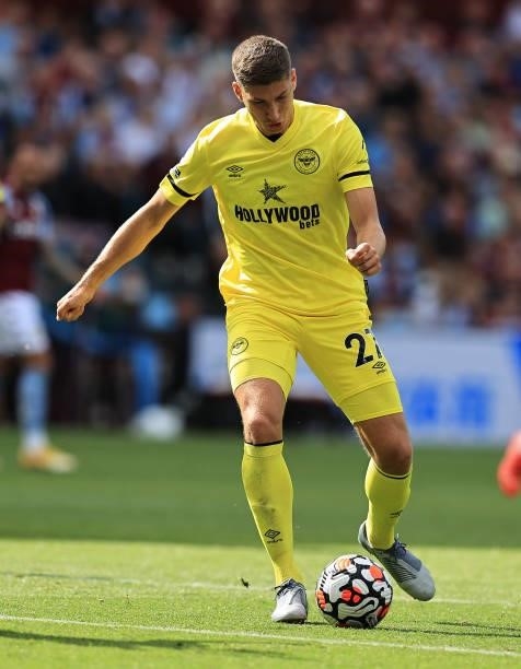 Vitaly Janelt of Brentford runs with the ball during the Premier League match between Aston Villa and Brentford at Villa Park on August 28, 2021 in...