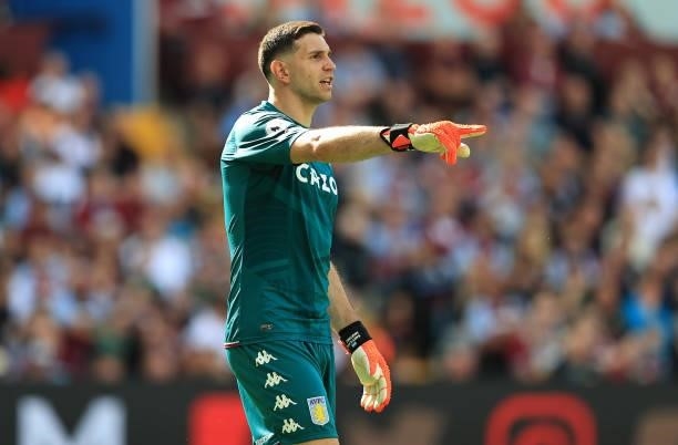 Emiliano Martinez of Aston Villa looks on during the Premier League match between Aston Villa and Brentford at Villa Park on August 28, 2021 in...