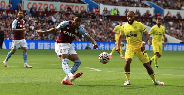 Ezri Konsa of Aston Villa clears the ball past Bryan Mbeumo during the Premier League match between Aston Villa and Brentford at Villa Park on August...