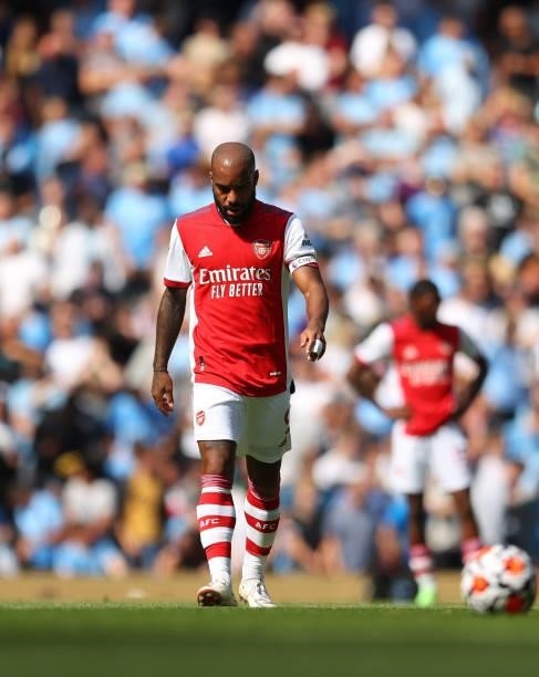 Dejected looking Alexandre Lacazette of Arsenal during the Premier League match between Manchester City and Arsenal at Etihad Stadium on August 28,...