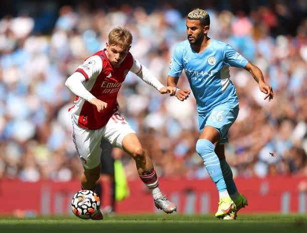 Emile Smith Rowe of Arsenal and Riyad Mahrez of Manchester City during the Premier League match between Manchester City and Arsenal at Etihad Stadium...