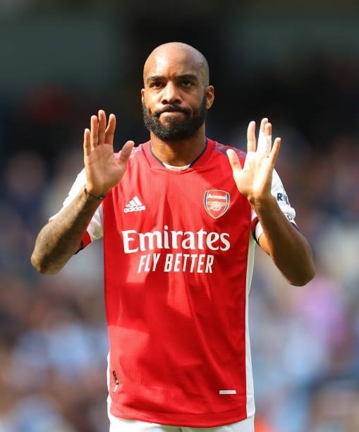 Alexandre Lacazette of Arsenal puts his hands up to the fans after the Premier League match between Manchester City and Arsenal at Etihad Stadium on...