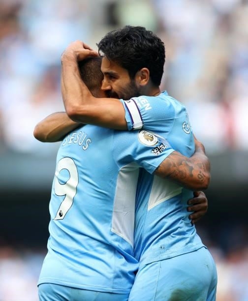 Ilkay Gundogan of Manchester City celebrates with Gabriel Jesus of Manchester City during the Premier League match between Manchester City and...