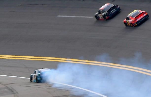Joe Graf Jr., driver of the G Coin Chevrolet, spins after an on-track incident during the NASCAR Xfinity Series Wawa 250 at Daytona International...