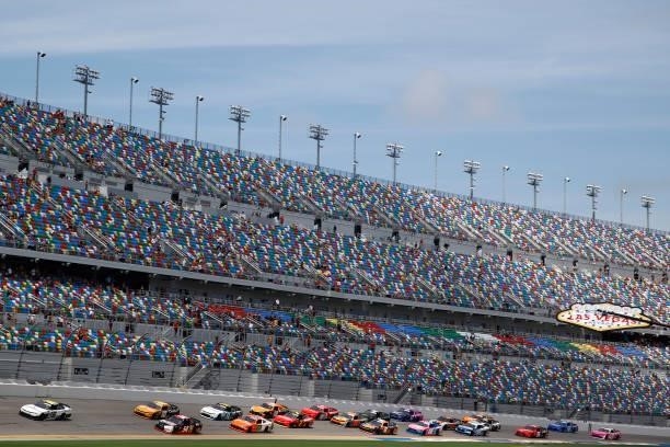Allmendinger, driver of the Hyperice Chevrolet, leads the field during the NASCAR Xfinity Series Wawa 250 at Daytona International Speedway on August...