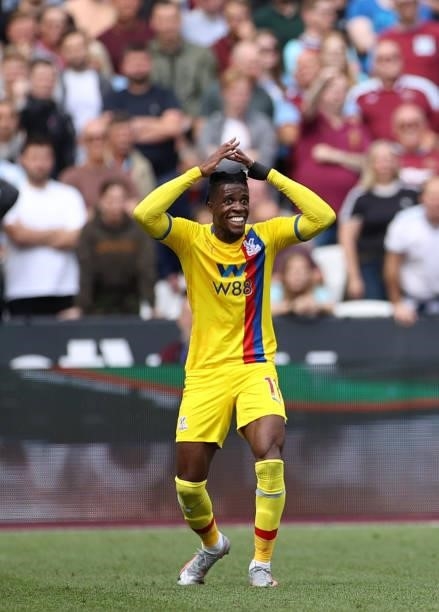 Wilfried Zaha of Crystal Palace reactsduring the Premier League match between West Ham United and Crystal Palace at London Stadium on August 28, 2021...