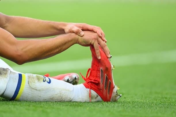 Cesar Azpilicueta of Chelsea stretches during the Premier League match between Liverpool and Chelsea at Anfield on August 28, 2021 in Liverpool,...