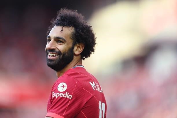 Mohamed Salah of Liverpool smiles during the Premier League match between Liverpool and Chelsea at Anfield on August 28, 2021 in Liverpool, England.