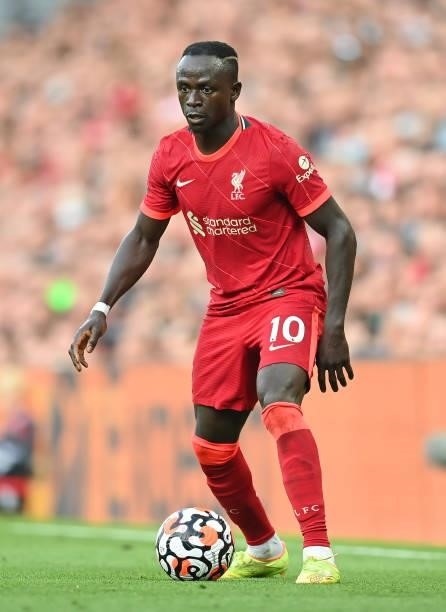 Saido Mane of Liverpool in action during the Premier League match between Liverpool and Chelsea at Anfield on August 28, 2021 in Liverpool, England.