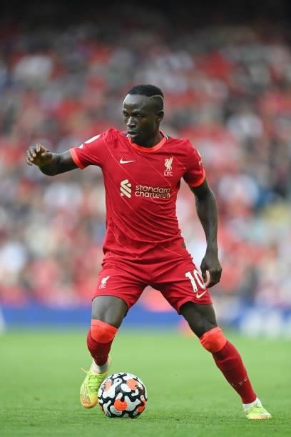 Saido Mane of Liverpool in action during the Premier League match between Liverpool and Chelsea at Anfield on August 28, 2021 in Liverpool, England.