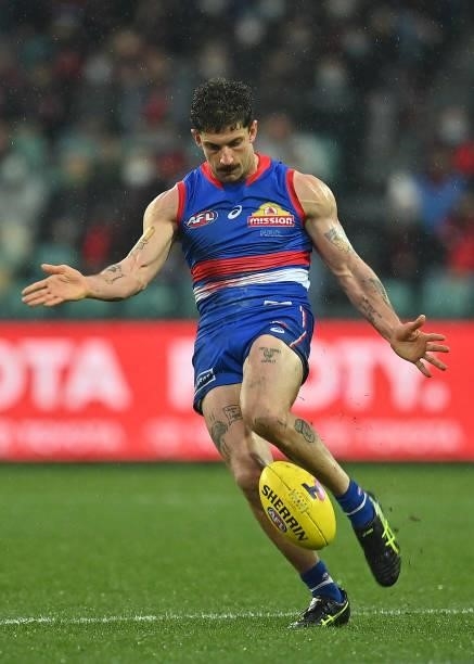 Tom Liberatore of the Bulldogs kicks during the AFL First Elimination Final match between Western Bulldogs and Essendon Bombers at University of...